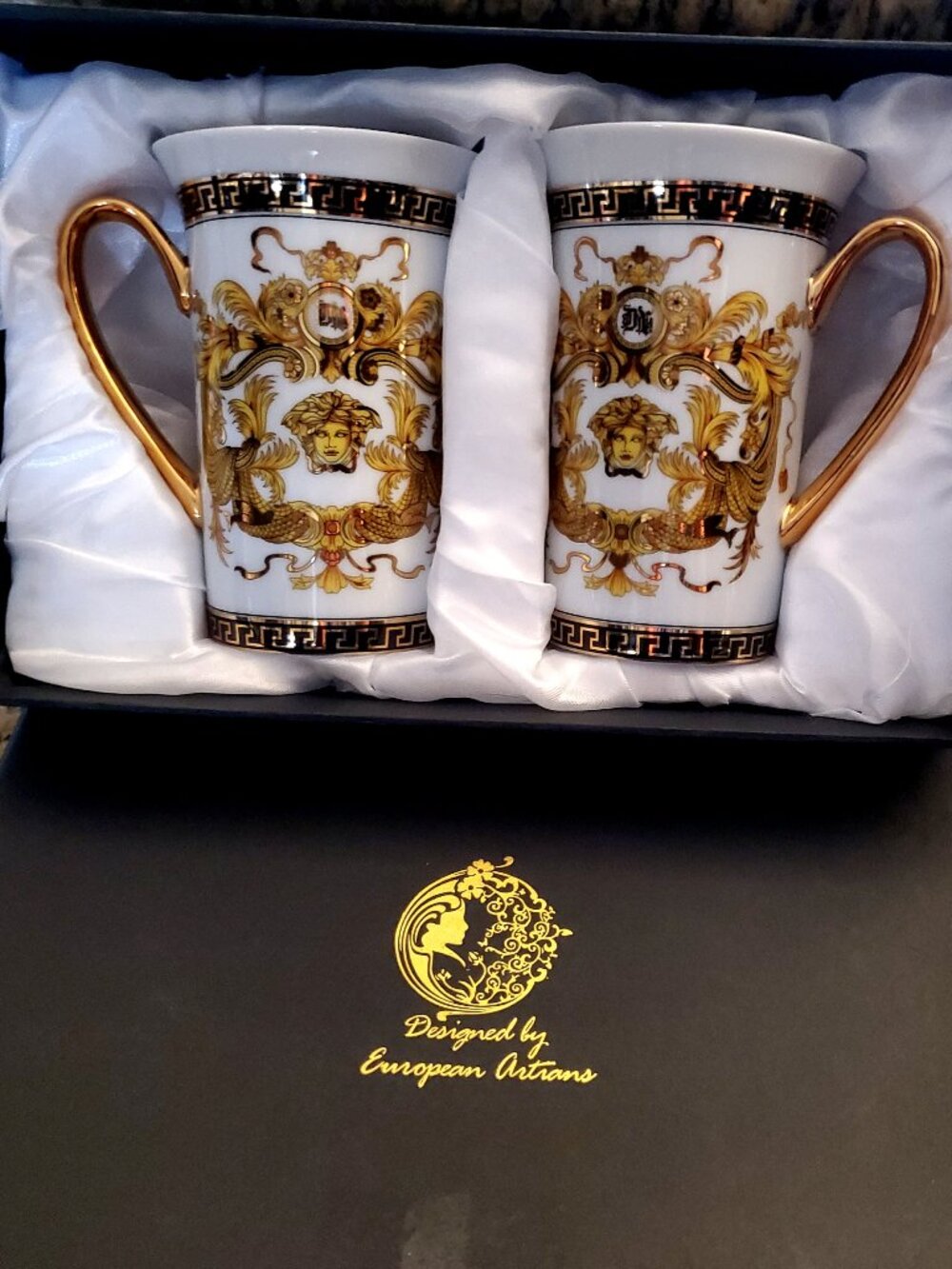 New set of 2 European Artesian Gold Black Mugs featuring a Versace Greek style